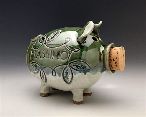 pottery piggy bank|More.